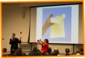 KaeLyn and Marshall presenting with a dental dam